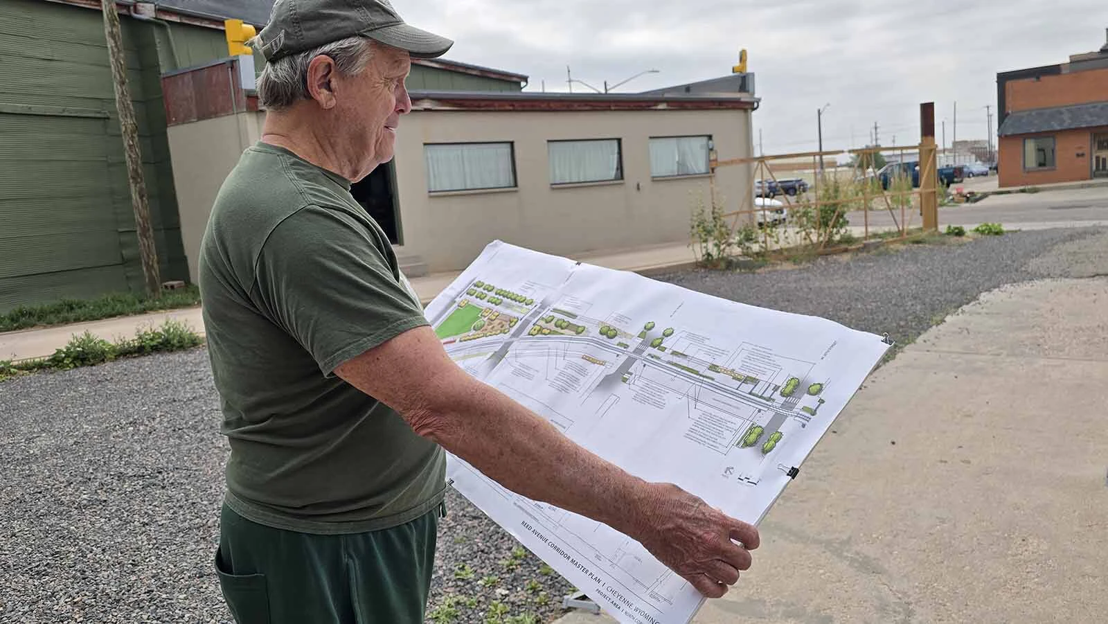 Cheyenne City Councilman Pete Laybourn holds up a map of the future Reed Avenue Corridor project, envisioned as a scenic, walkable area interspersed with retail businesses, including Westby's and now the Ful-O-Pep grain elevator's corner.