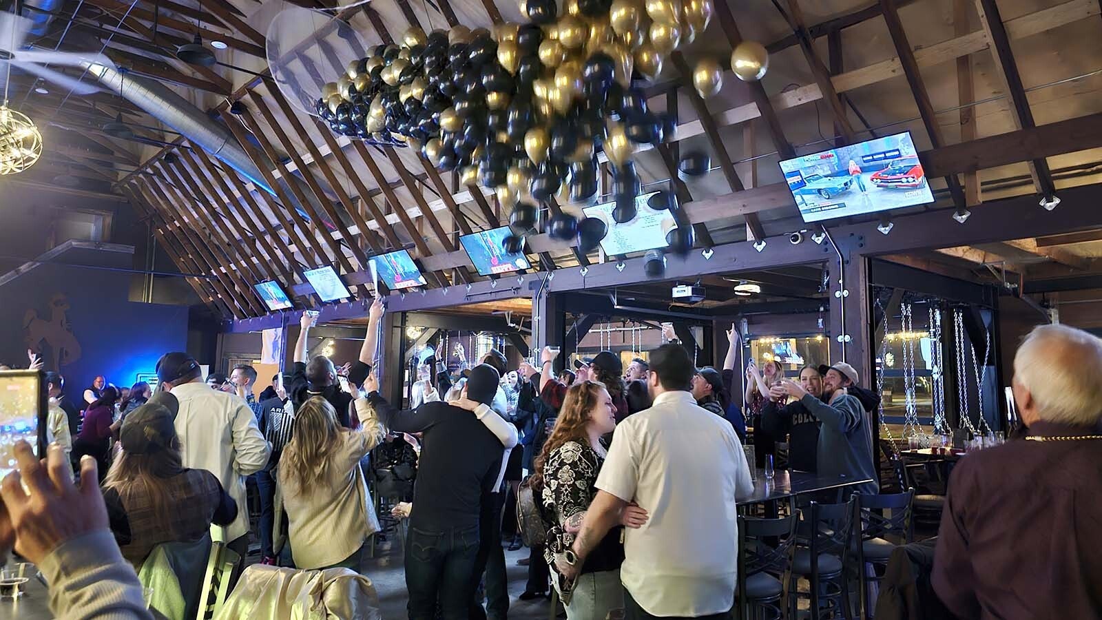 Balloons drop during the first New Year's Eve celebration at Westby Edge Brewing Company, Cheyenne's newest brewery.