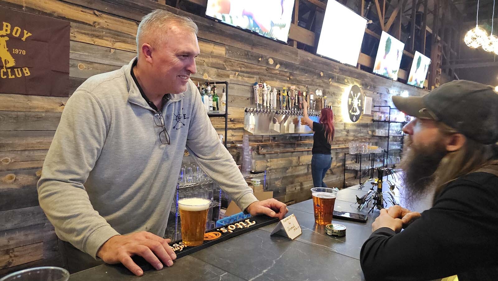 Darin Westby speaks with customers at Westby Edge Brewing Company.