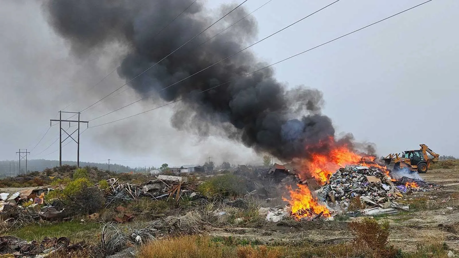 An illegal controlled burn in Weston County on Tuesday included a large pile of household trash, old construction materials and other junk. Three fire engines, two water tenders, a bulldozer and a command unit responded, along with a Weston County sheriff's deputy, a contracted mini excavator from Farnsworth Services and crews from Powder River Energy.