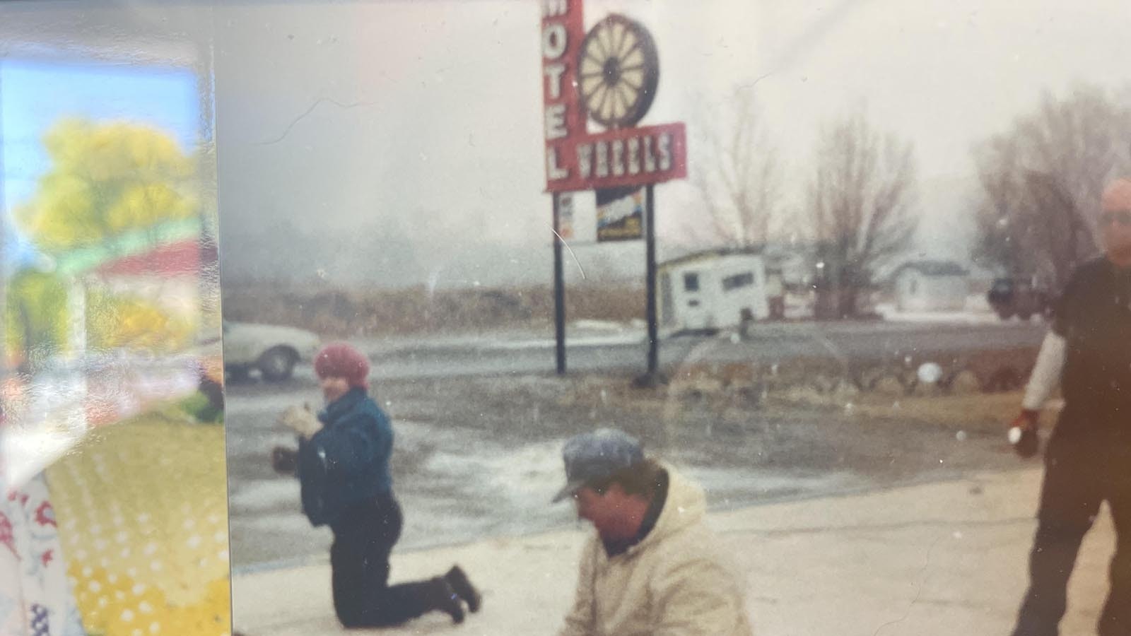 An old photo showing Chris Harwood working with his dad to build new units at the Wheels Motel in the 1990s.