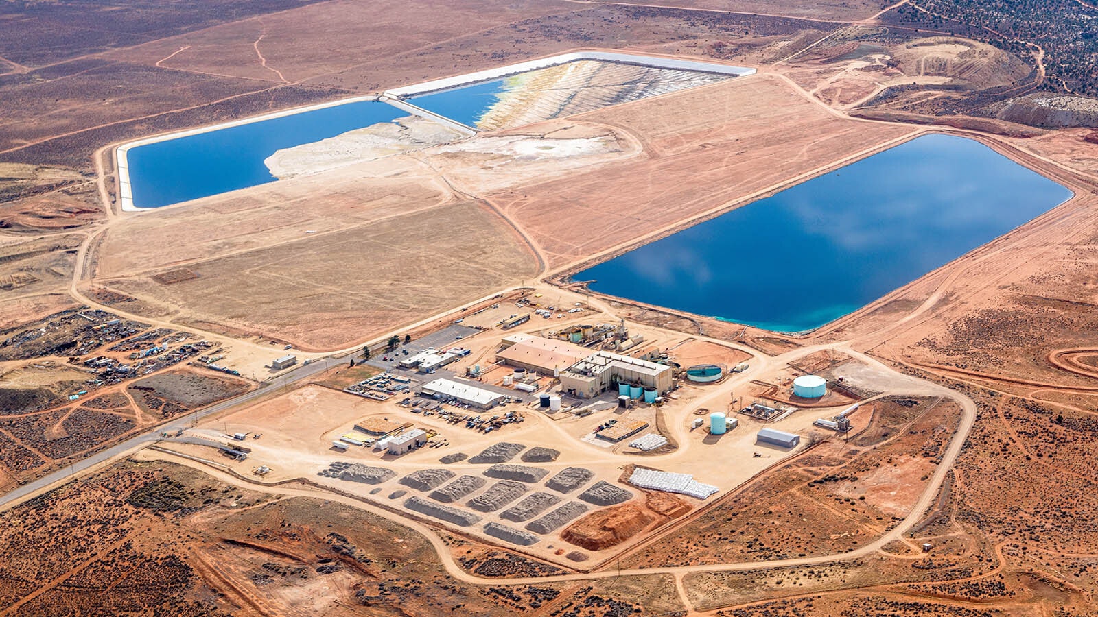 A uranium mill in Utah with ties to operations stretching from Wyoming to Madagascar is retooling to process rare earths. That could be good news for Wyoming mines, which are accelerating their production plans. Here's an aerial look at that plant, the White Mesa facility.