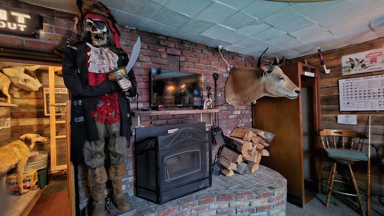 A skeleton knight guards the backroom, along with this longhorn steer at the White Wolf Saloon in Douglas.
