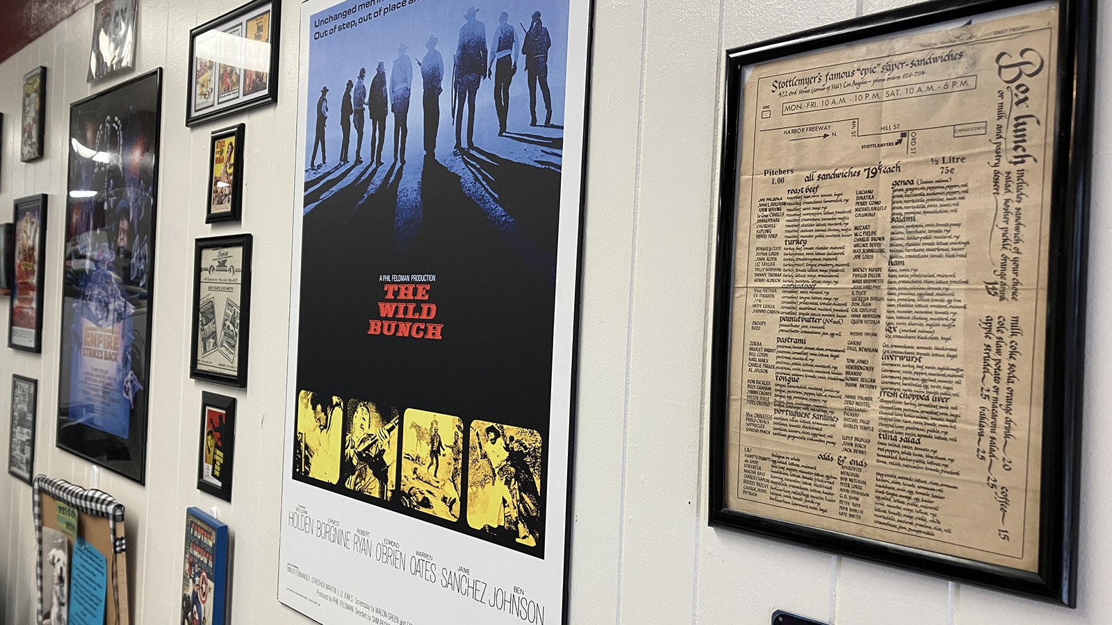 Movie posters decorate the walls of The Wild Lunch Market and there is also a menu from a Hollywood deli on the wall.