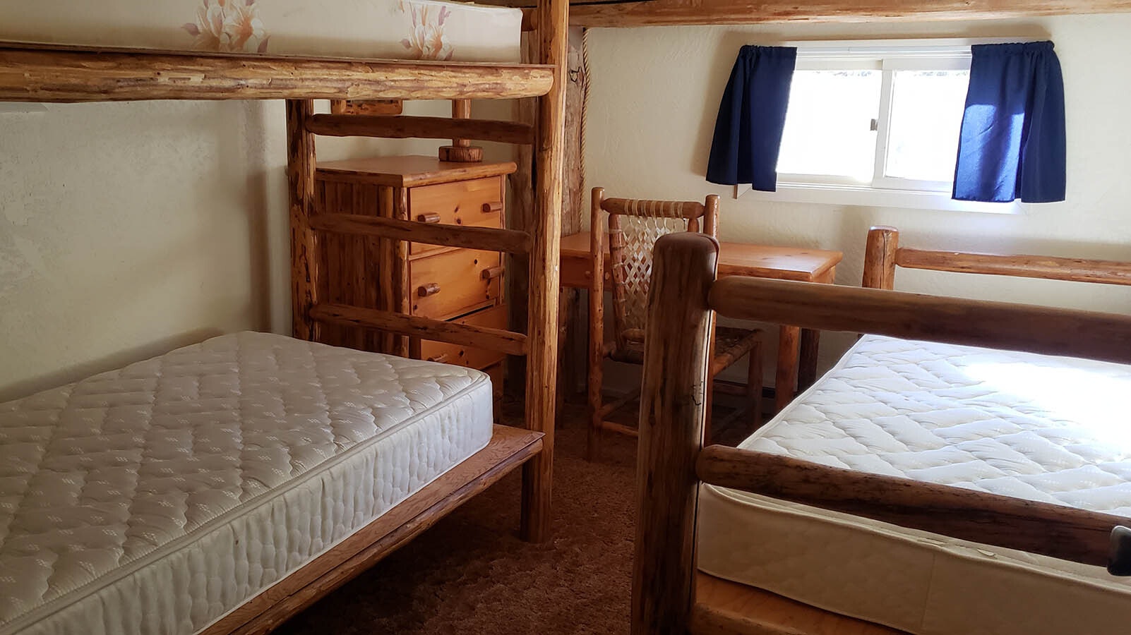 Bunk beds have been stuffed into the 16 guest rooms at the Granite Creek Ranch Lodge.