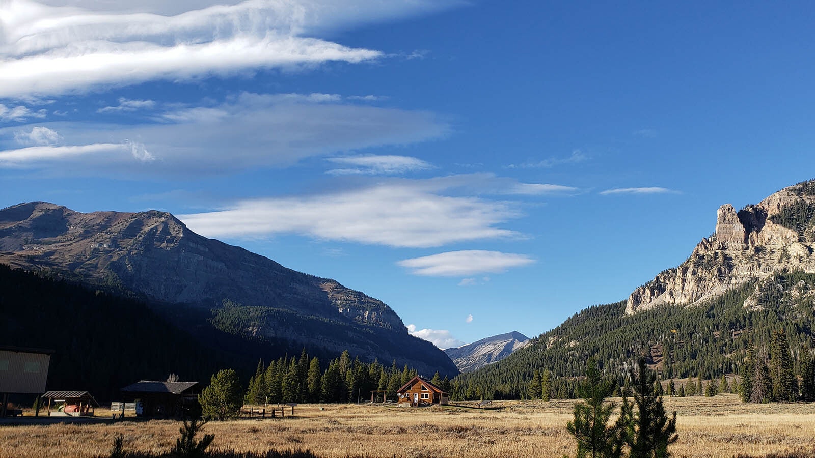 The view is amazing at Granite Creek Ranch. The caretakers' residence appears small beside the mountains.
