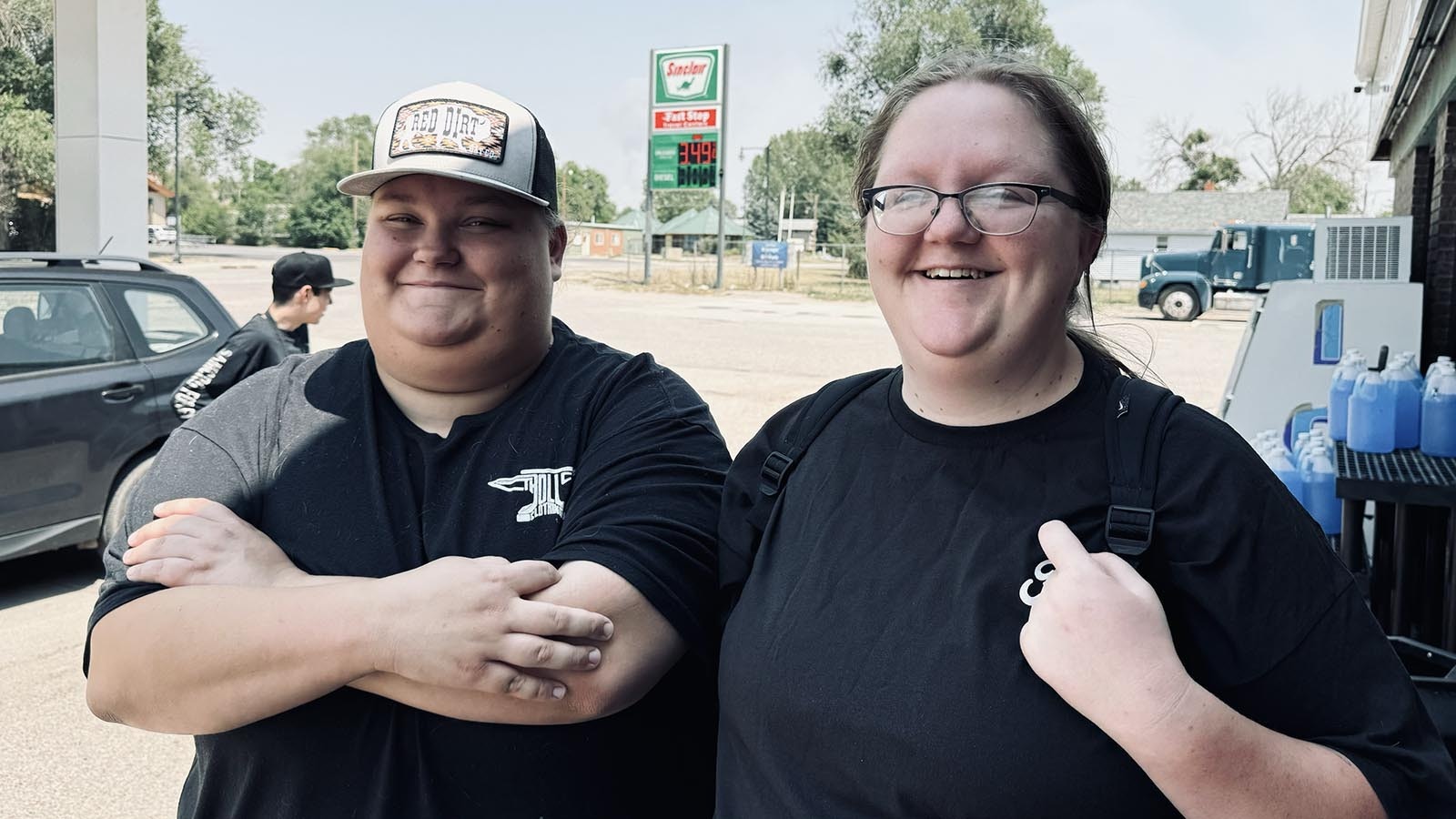 From left, volunteer firefighters Alaina Maters and Haylee Warner, who drove fire trucks filled up with 800-to-1,500 gallons of water into the hills leading into the Haystack Mountains late into the evening for her father, a firefighter with the Guernsey Rural fire department.