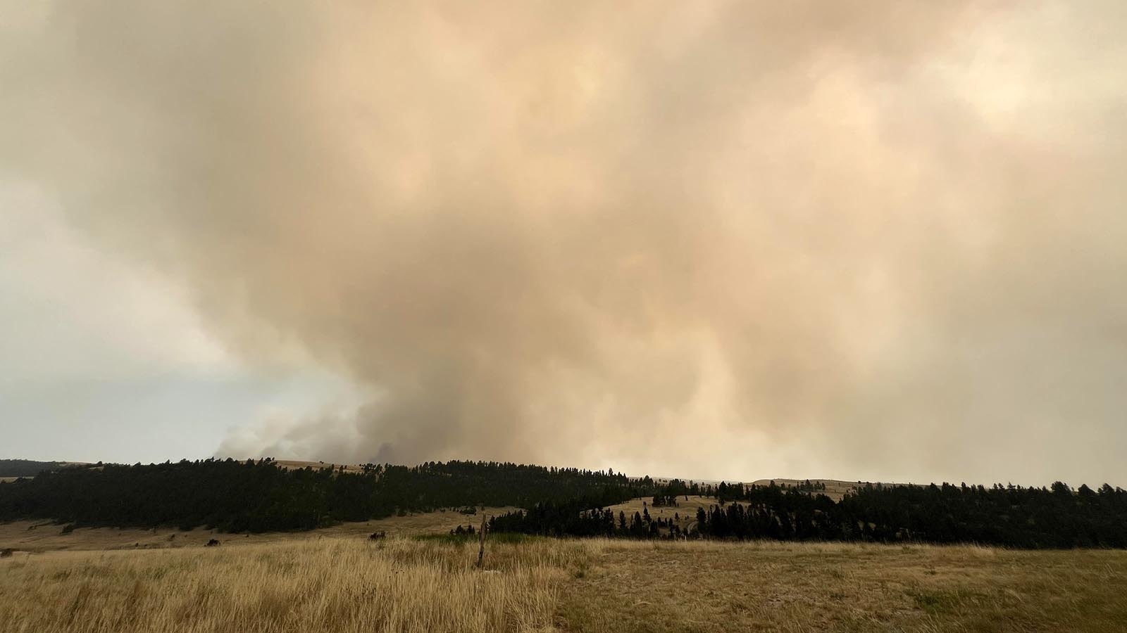 An out-of-control wildfire burns close to the Kindness Ranch in eastern Wyoming.
