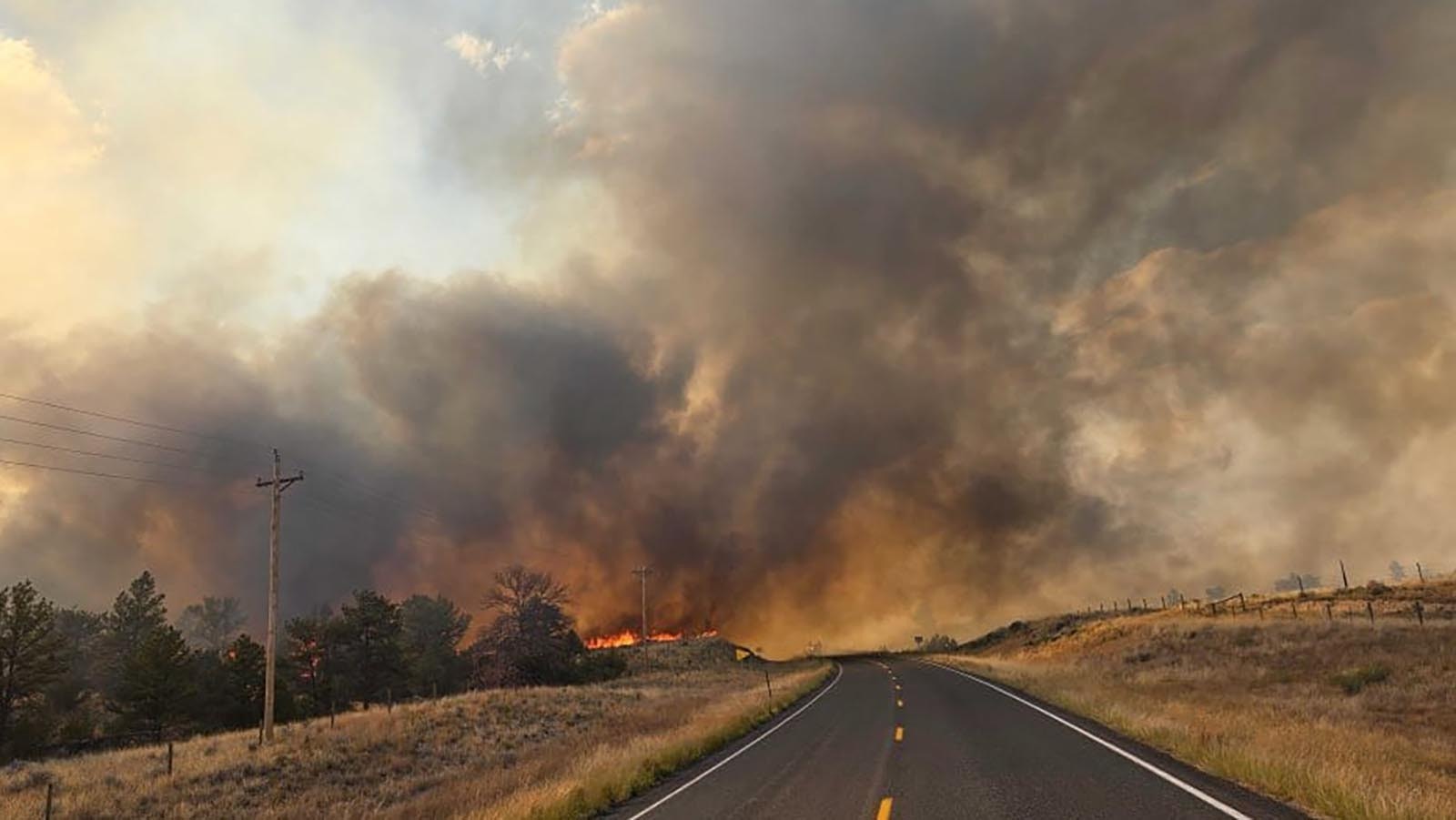 A large wildfire comes right up to Highway 26 in eastern Wyoming.