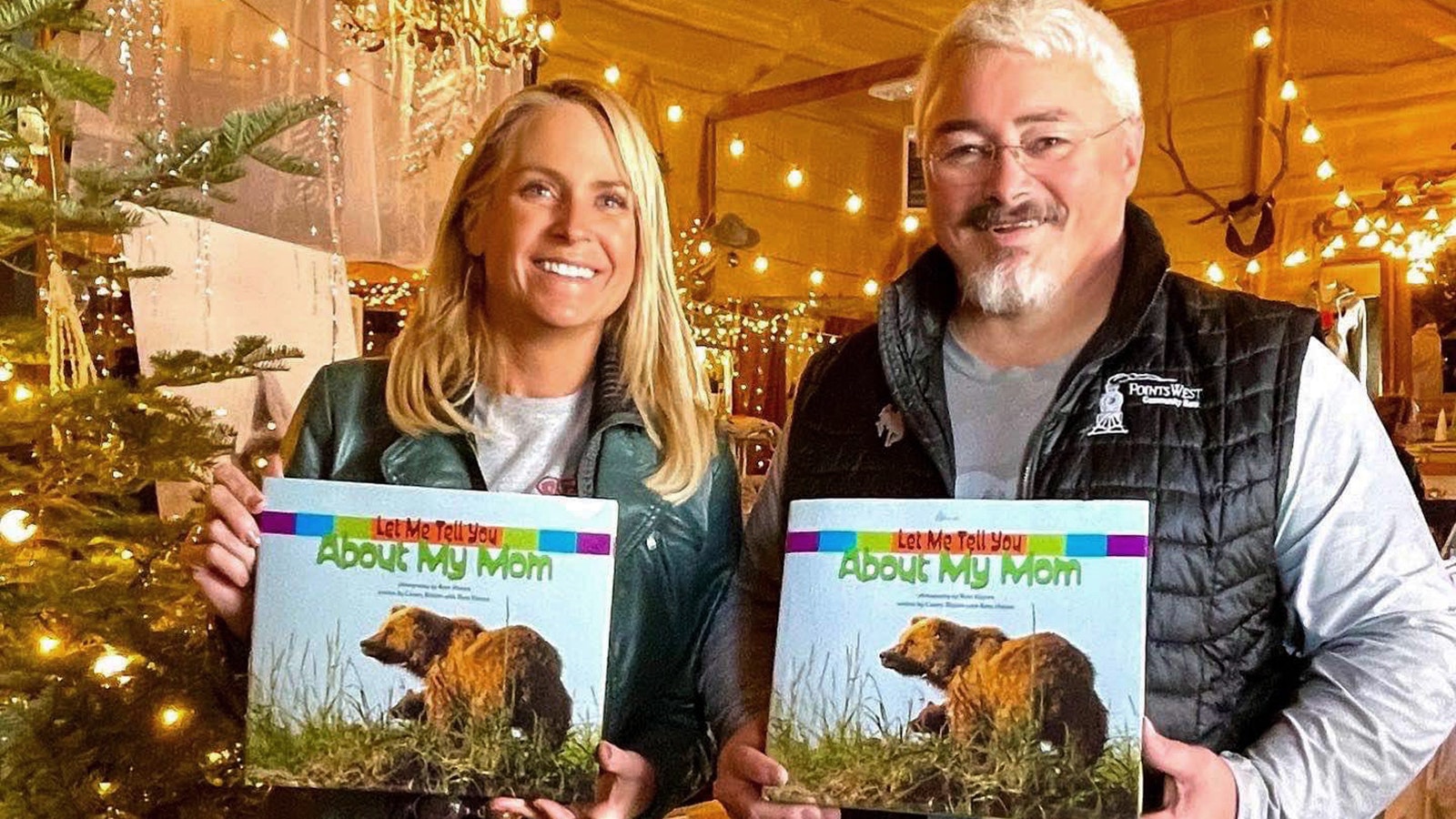 Casey Rislov of Casper (left) and Ron Hayes of Douglas hold copies of their book "Let Me Tell You About My Mom."