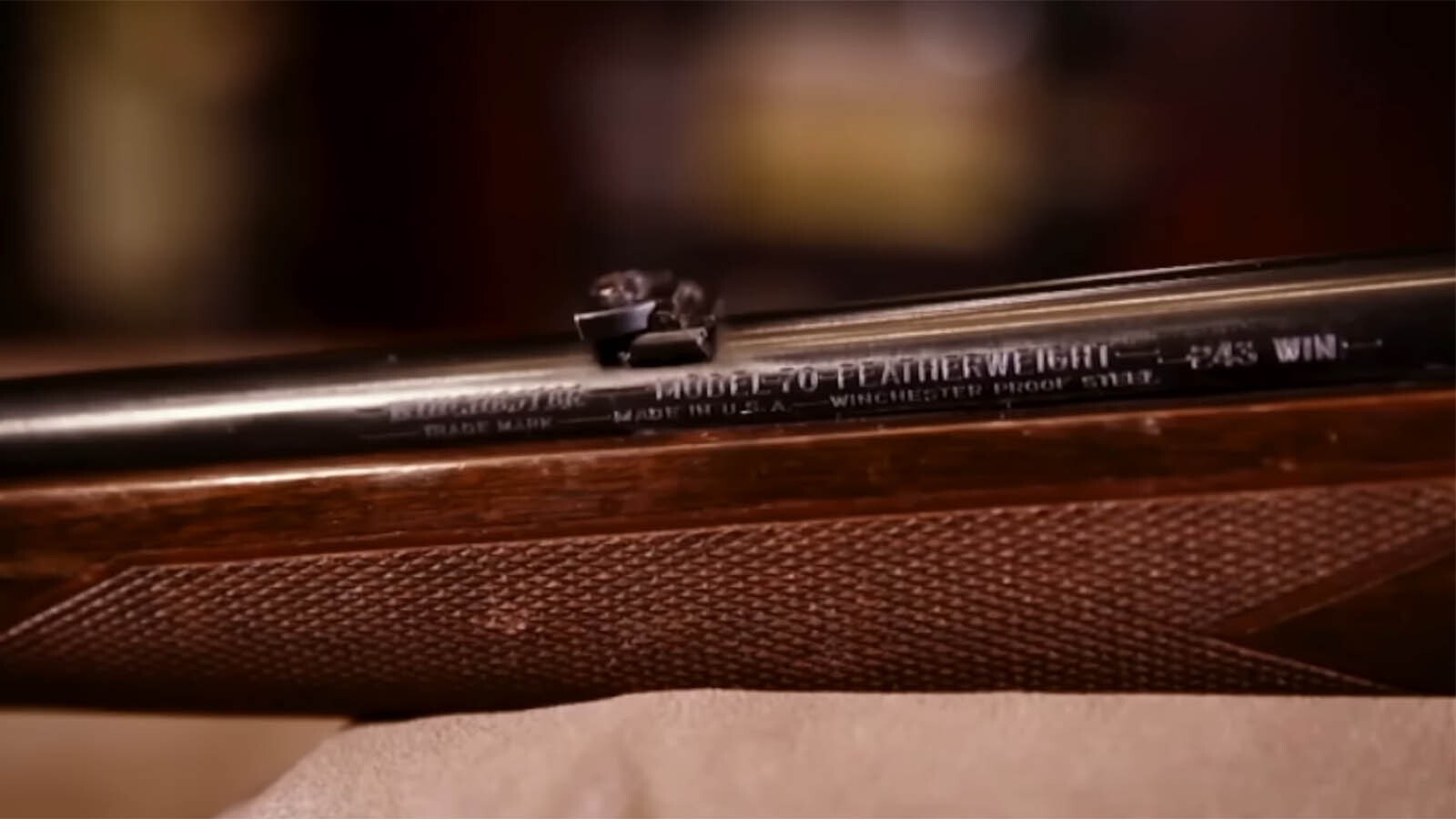 Close up of the serial number of a Winchester Model 70.