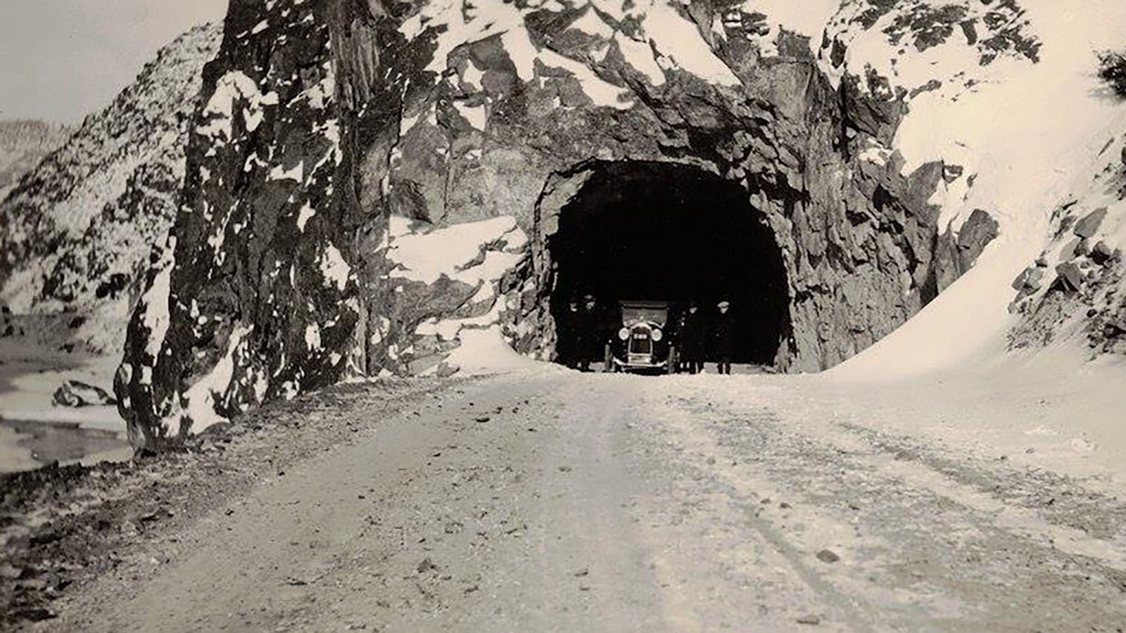 Coming through the second tunnel of the Yellowstone Highway in Wind River Canyon during the first trip on the road in 1924.
