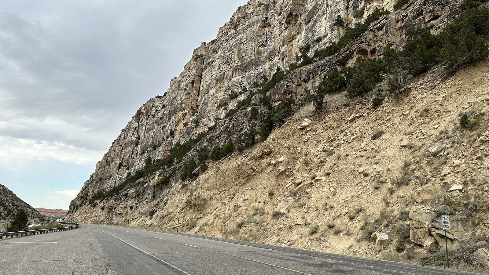 The northern end of the Wind River Canyon, opening up to the Bighorn Basin. A trip through the Wind River Canyon is a chronologically accurate trip through several layers of rock spanning 2.5 billion years.