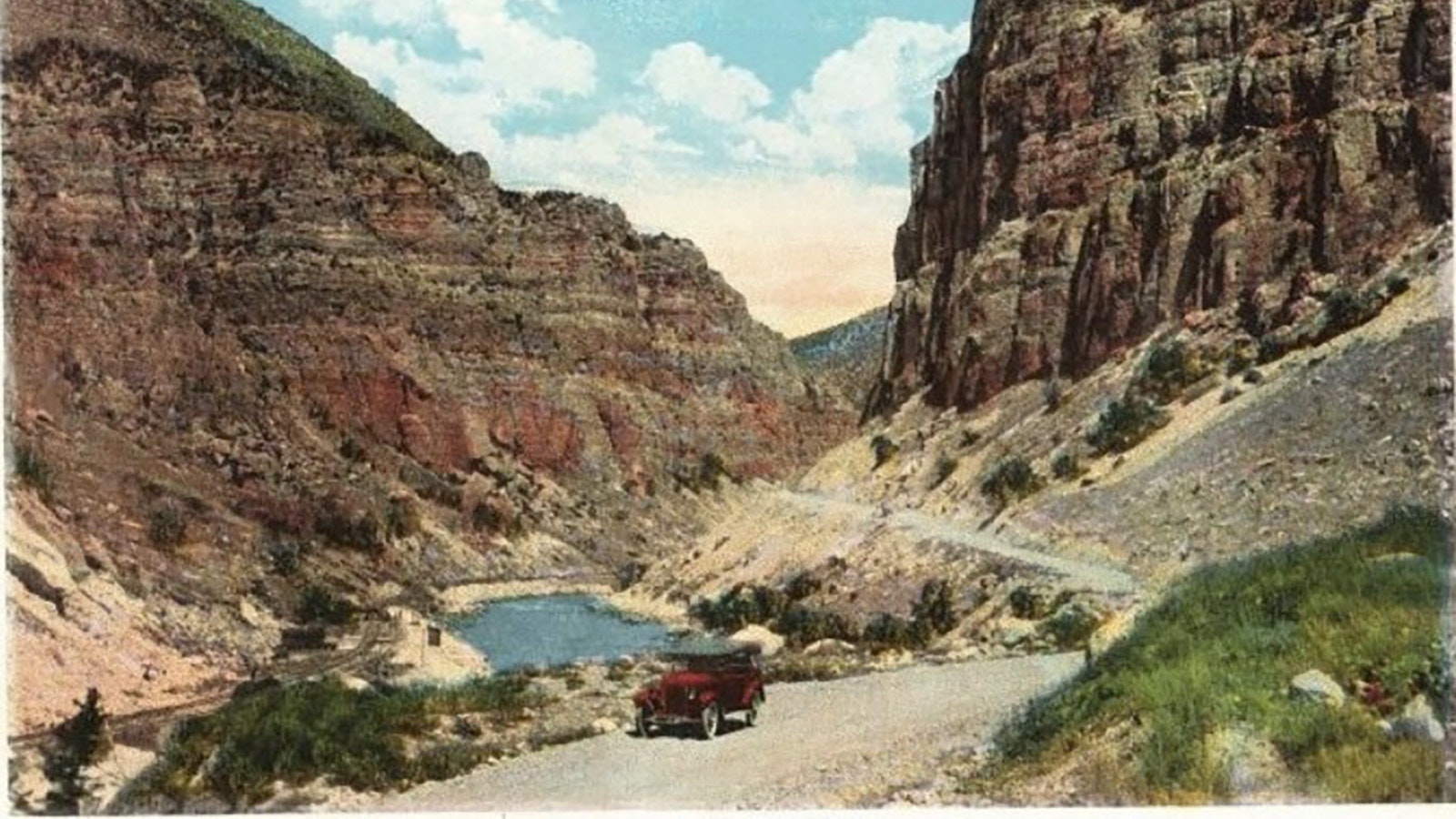 This vintage post card shows the road that became the Wind River Scenic Byway.