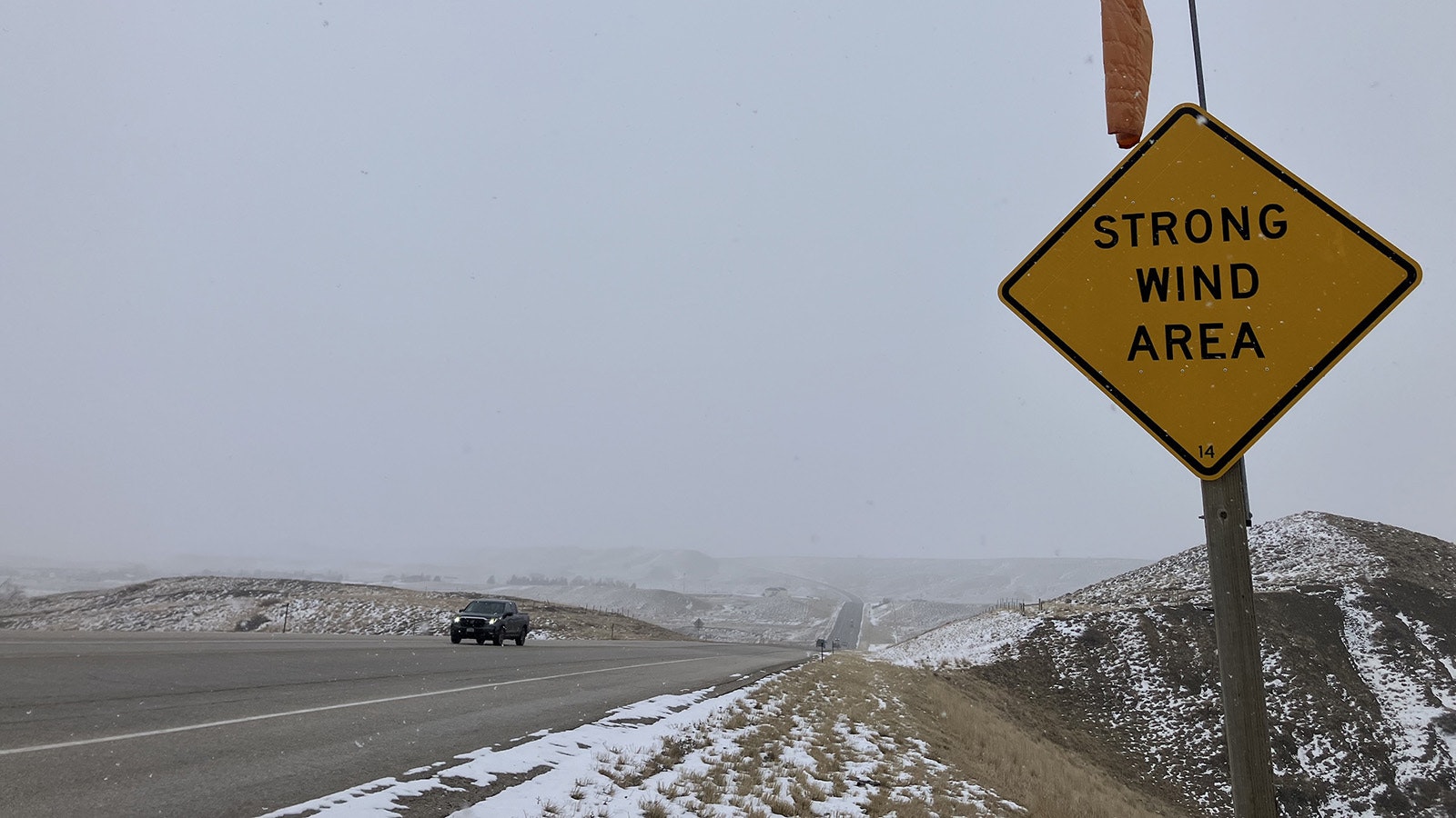 Wyoming features windsocks along the highway as well as at the airport. Strong wind gusts can topple high profile vehicles.