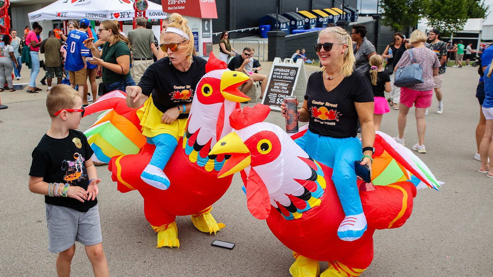 A couple of strange birds at the chicken wing festival.