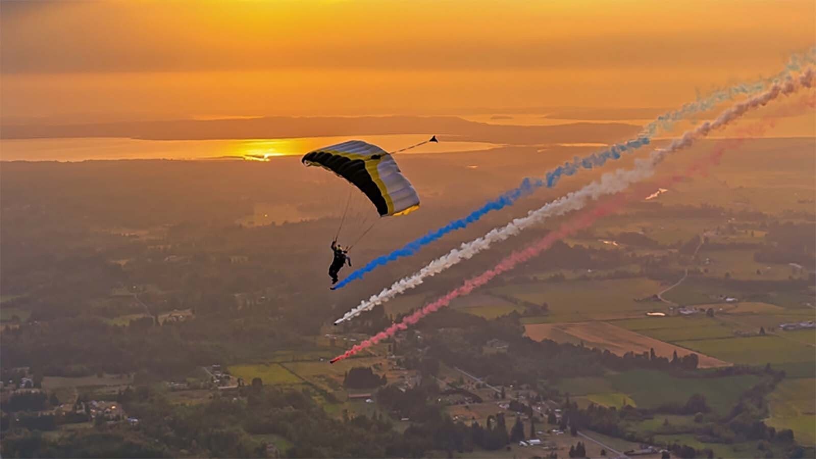 Nikko Mamallo parachutes down during an airshow in the Pacific Northwest.