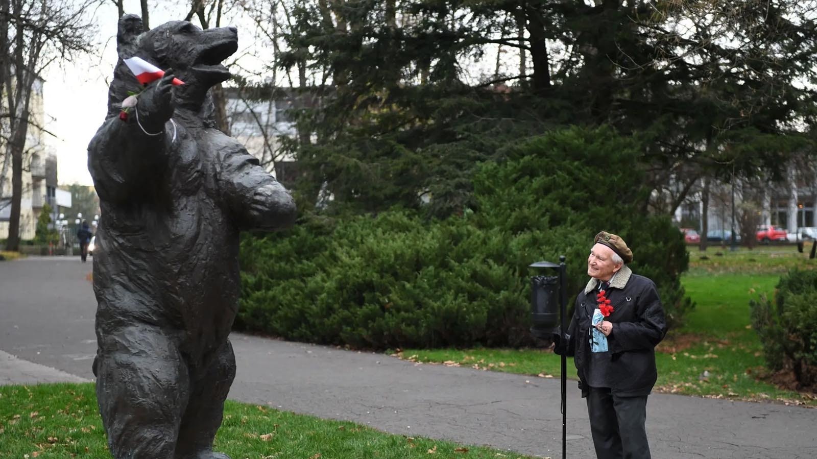 93-year-old former Polish soldier Wojciech Narebski stands in front of a monument of brown bear Wojtek, who was his fellow Polish soldier during World War II in Krakow.