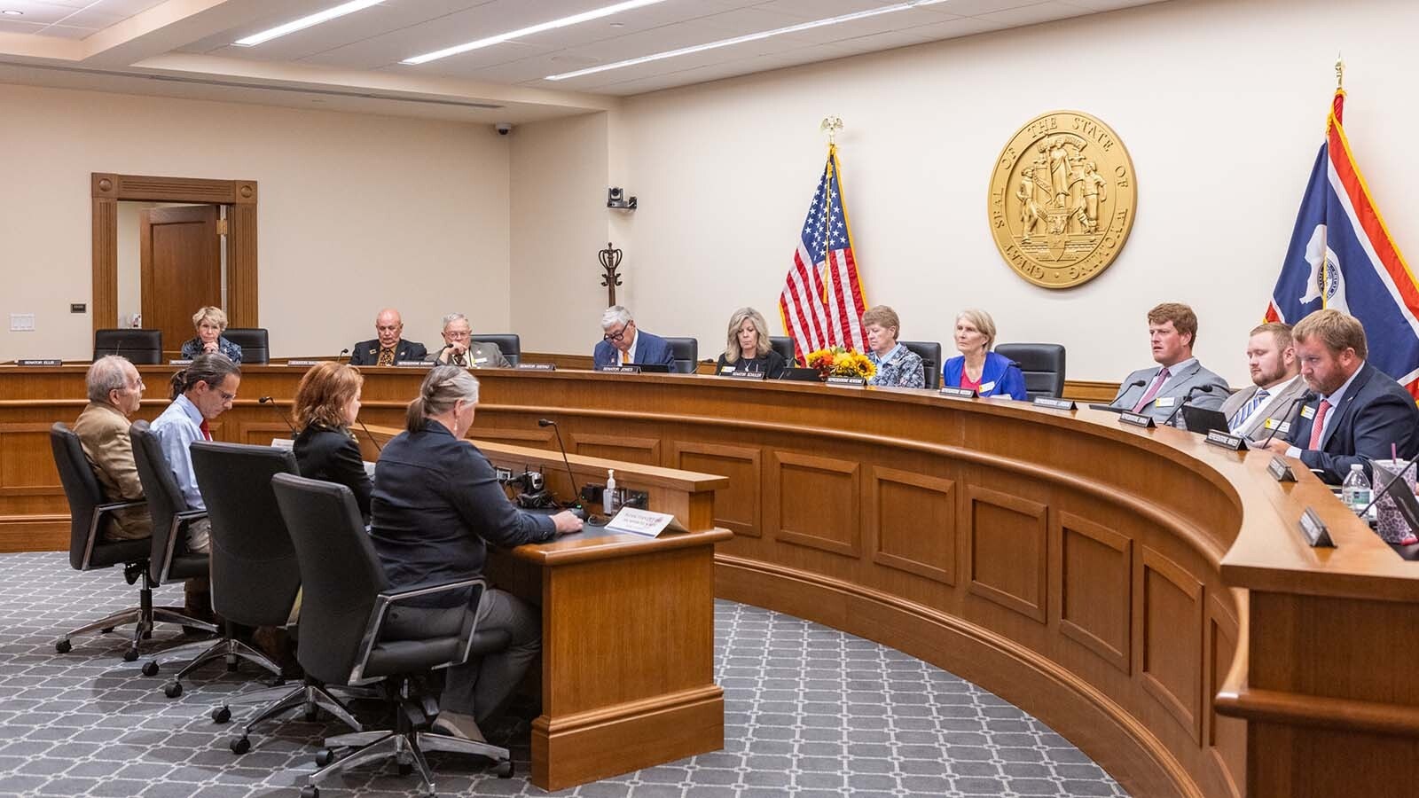 A vocal crowd showed up to give comment to the Joint Travel, Recreation and Wildlife Resources Committee meeting at the Wyoming Capitol in Cheyenne on Monday, Sept. 30, 2024. Most spoke against a proposed bill that stops short of banning running down wolves and other predators with snowmobiles.