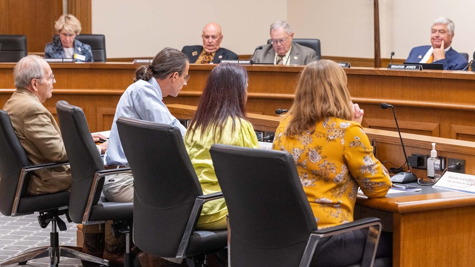 A vocal crowd showed up to give comment to the Joint Travel, Recreation and Wildlife Resources Committee meeting at the Wyoming Capitol in Cheyenne on Monday, Sept. 30, 2024. Most spoke against a proposed bill that stops short of banning running down wolves and other predators with snowmobiles.