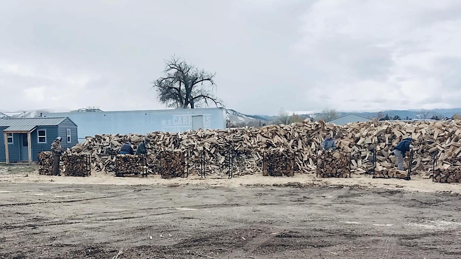 Wood is placed in racks at Clear Creek Wood Bank ready for patrons to arrive.