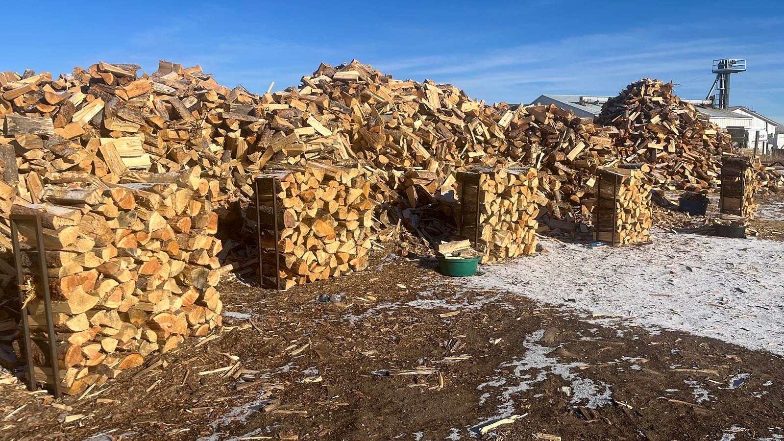 Racks of wood are ready for people to pull in on Tuesdays and be loaded up.