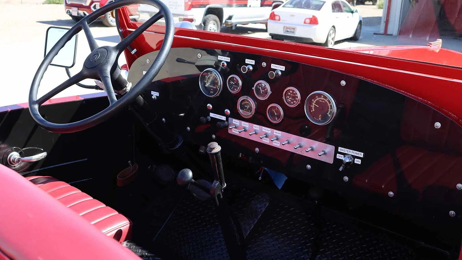 The dashboard of the 1942 truck has switches for all the various lights and a master power switch that needs to be on before the truck can be started using two ignition choke-like levers and a starter switch on the other side of the steering column.