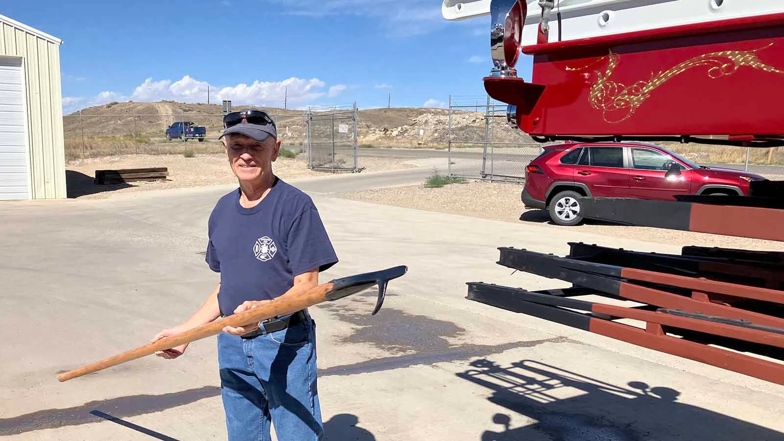 Bruce Nielson holds a pike pole that he restored. He found it on the truck.