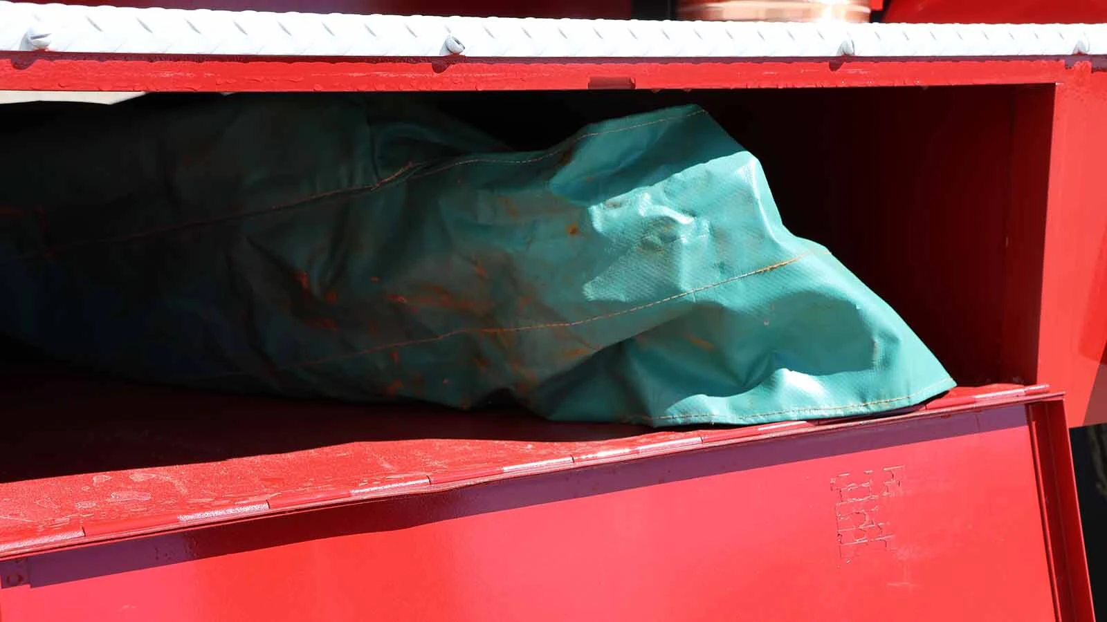 An original rescue net that was with the truck requires 12 firefighters to hold it to same those jumping to safety.