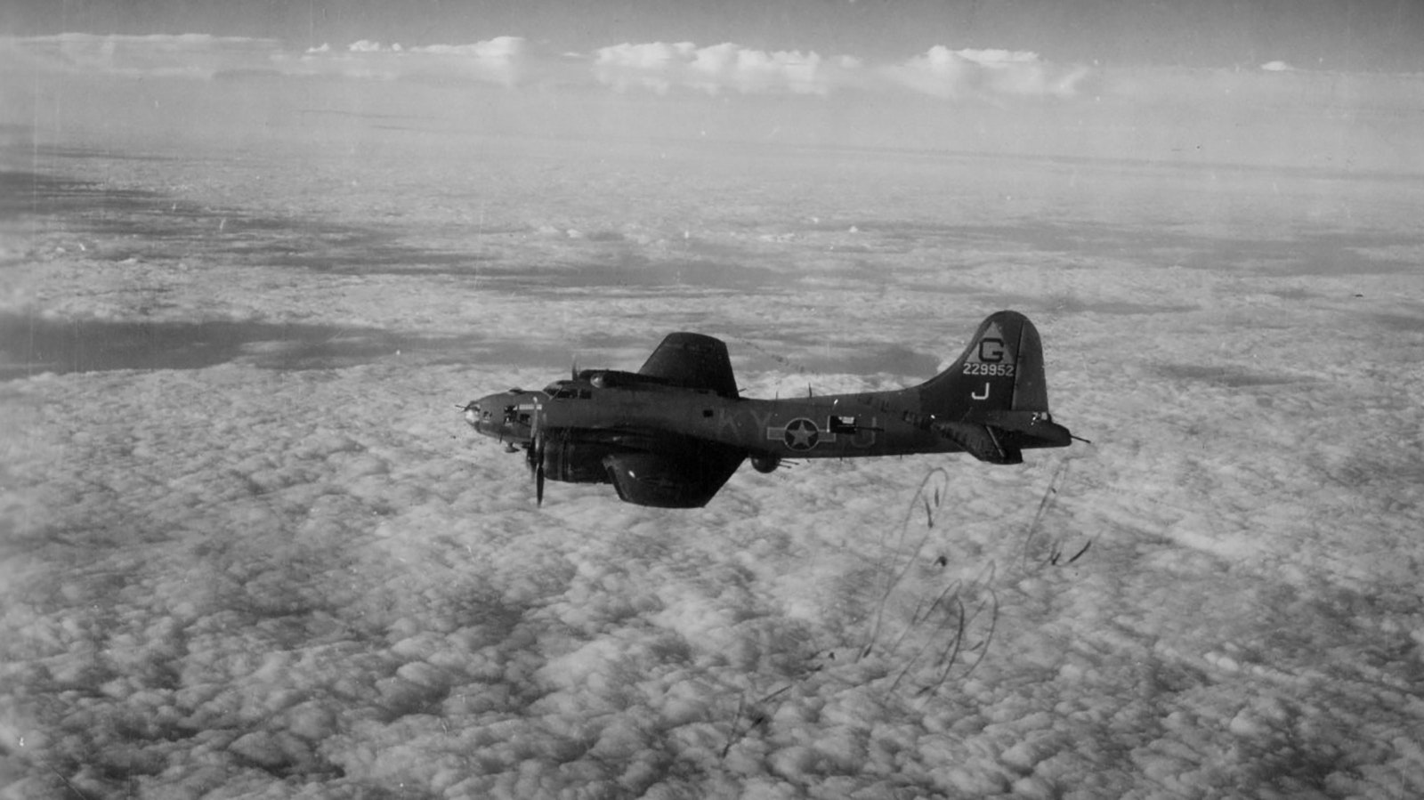 The B-17 “Sizzle” in flight with Bill Sikes at the controls during World War II.