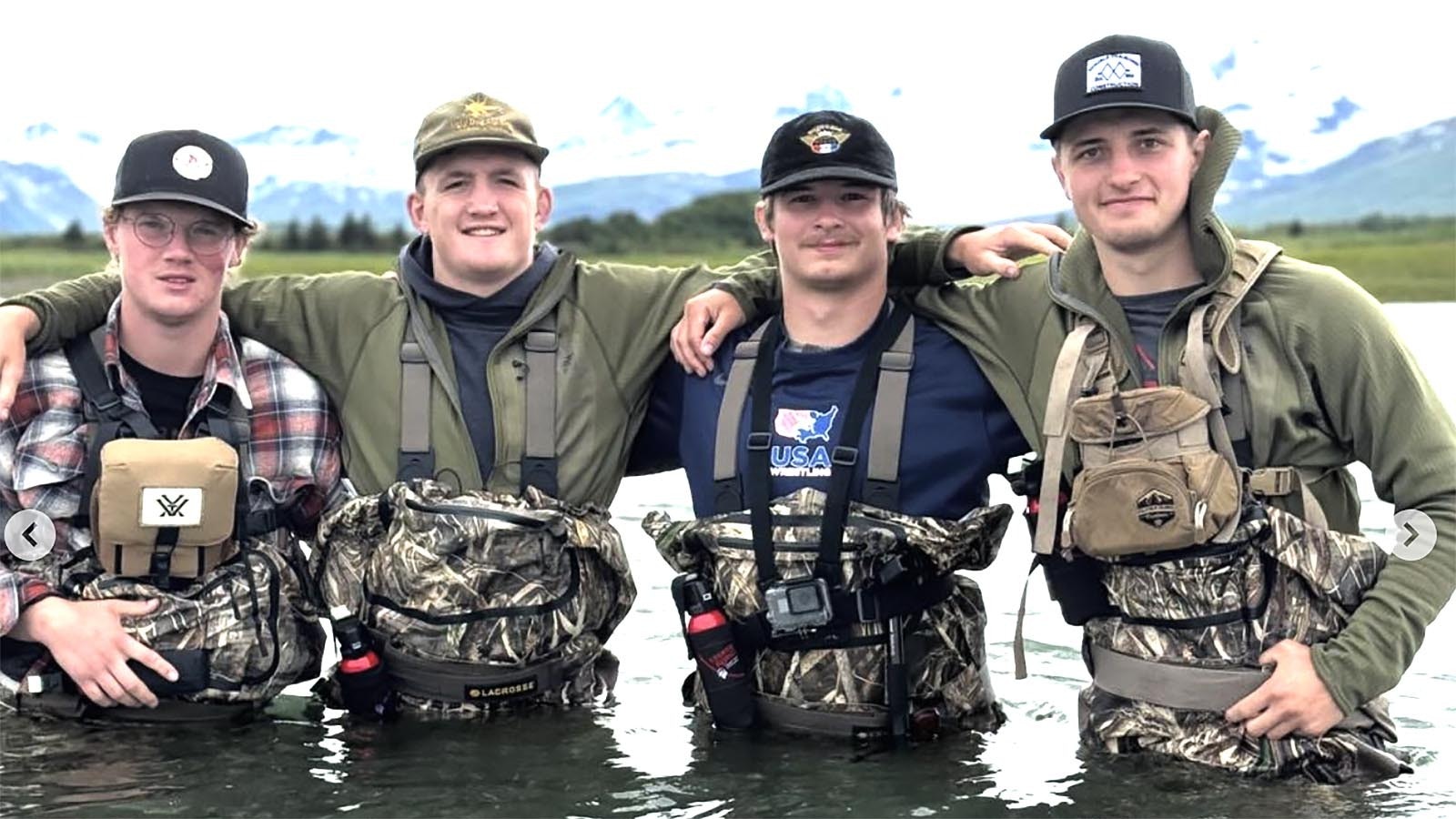 Former Wyoming college wrestlers Kendell Cummings, from left, Orrin Jackson, August Harrison and Brady Lowry got a free trip to Alaska to film a documentary on the 2022 grizzly attack they survived.