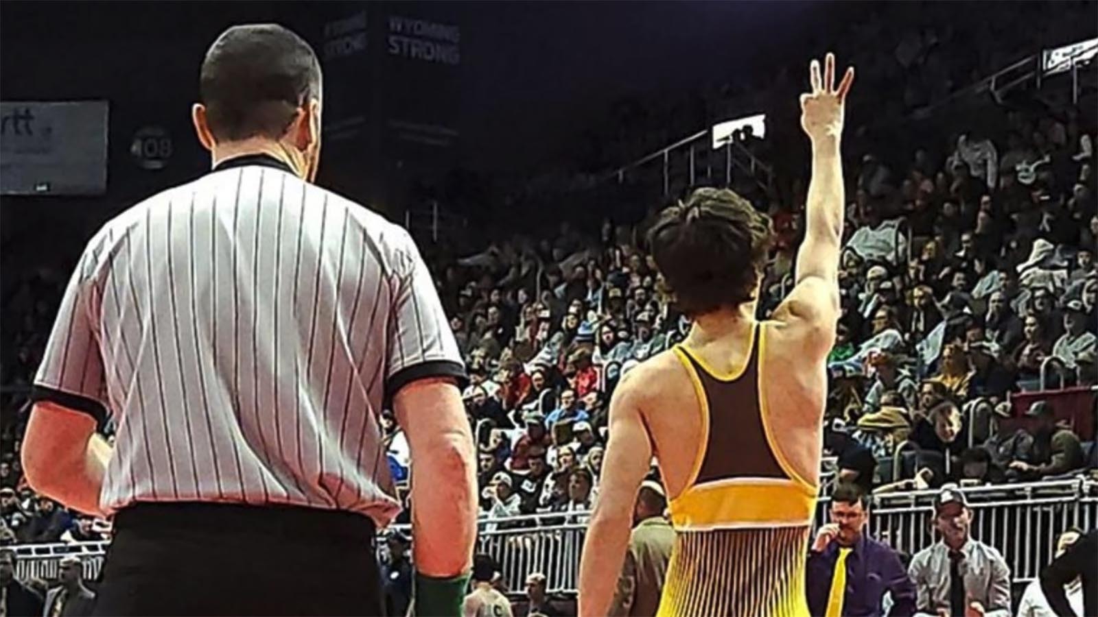 A Wyoming high school wrestling official after a state championship match.