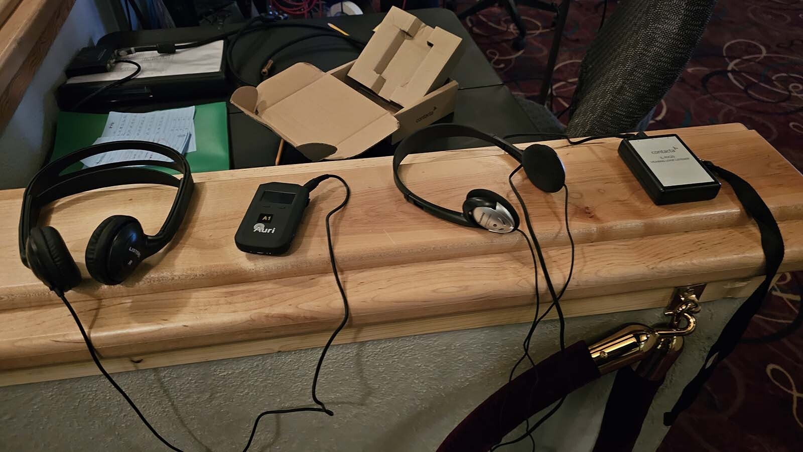 A couple of different Auri-compatible headsets, now available at the WYO Theater.  The newly installed system isn't just for those who are hearing impaired though. It can be used by anyone with compatible headphones or earbuds.