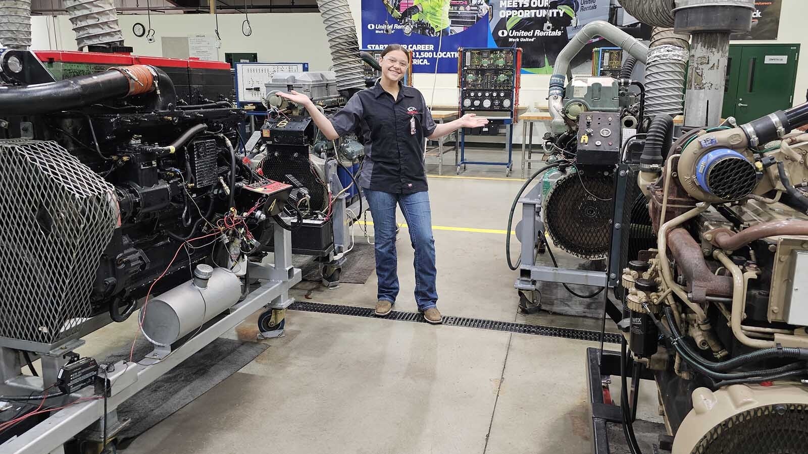 Shayna Rodrigues shows off her classroom area in the diesel mechanics area. These are four of the engines she'll be working on in her next phase of coursework at WyoTech in Laramie, Wyoming.