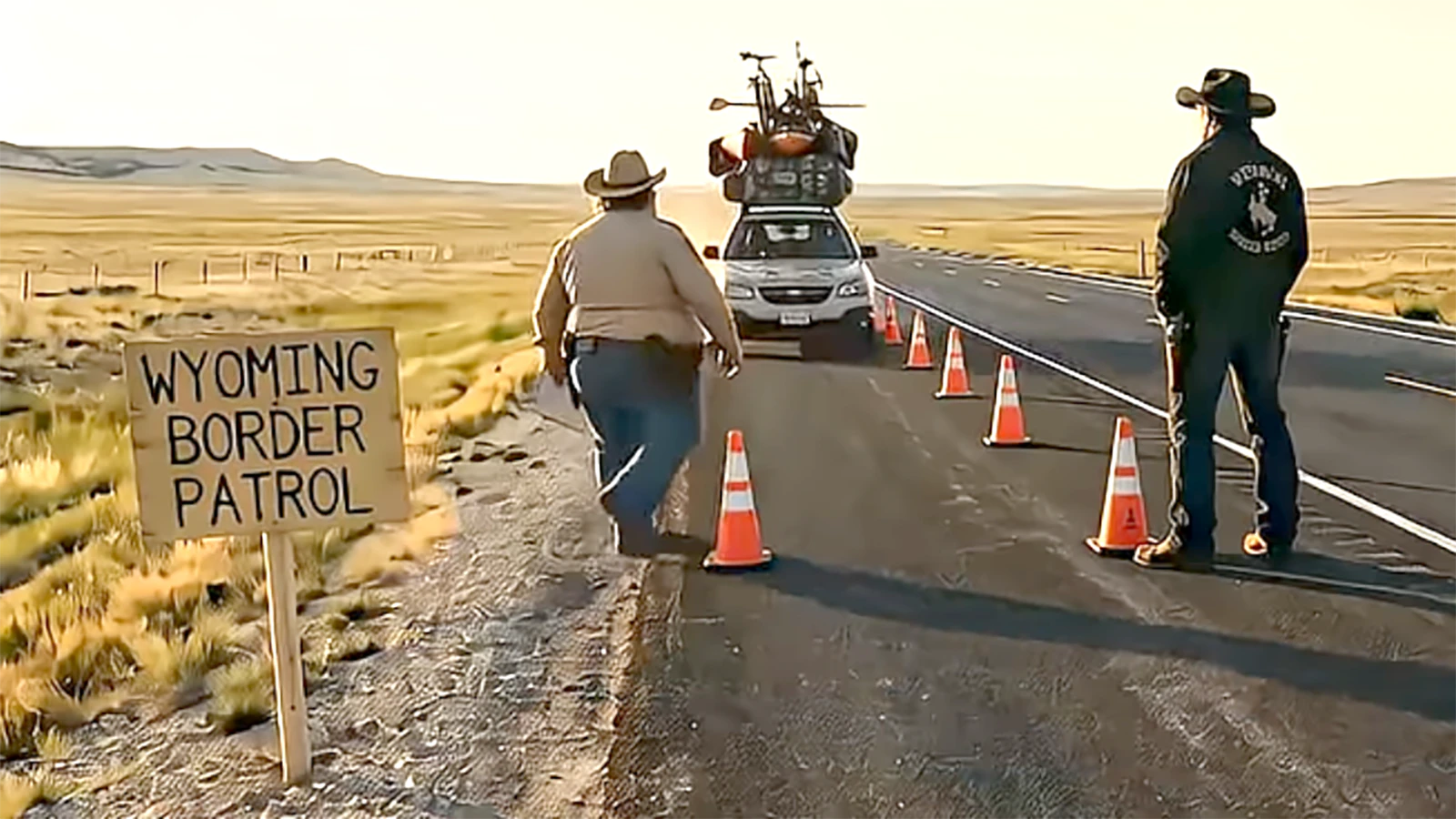 Wyoming Border Patrol Agents Buford, left, and Rip stop a Coloradan coming into the state on Highway 287 driving a Subaru with six bicycles strapped to the top.