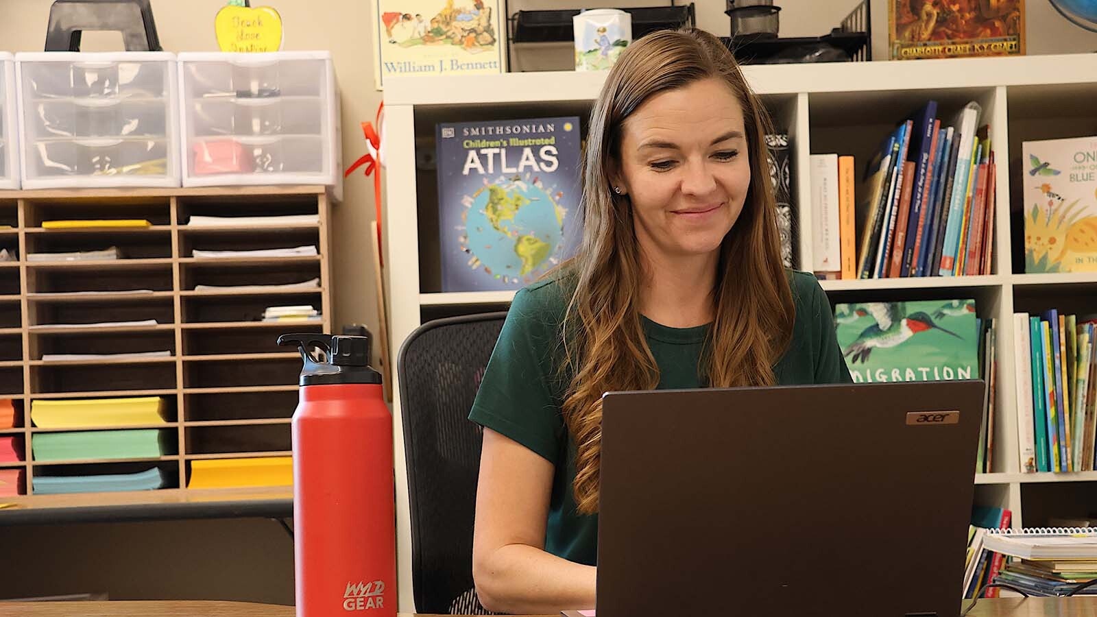First-grade teacher Emily Baird said she likes the “rigorous curriculum” the school provides her students.