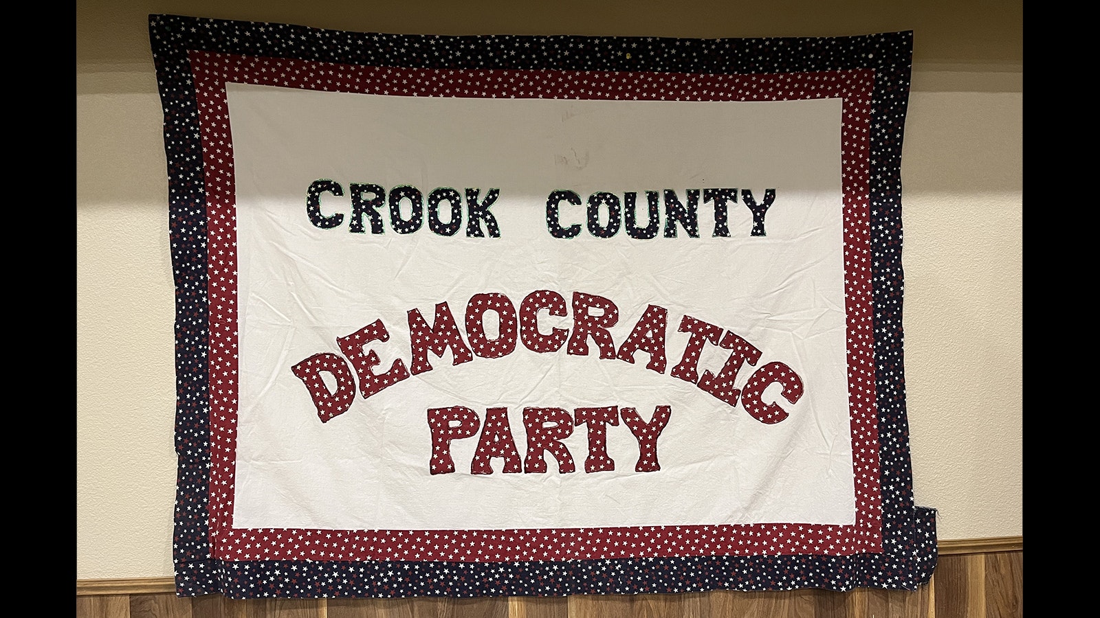 A quilted sign for the Crook County Democratic Party at Saturday's state central committee meeting in Newcastle.