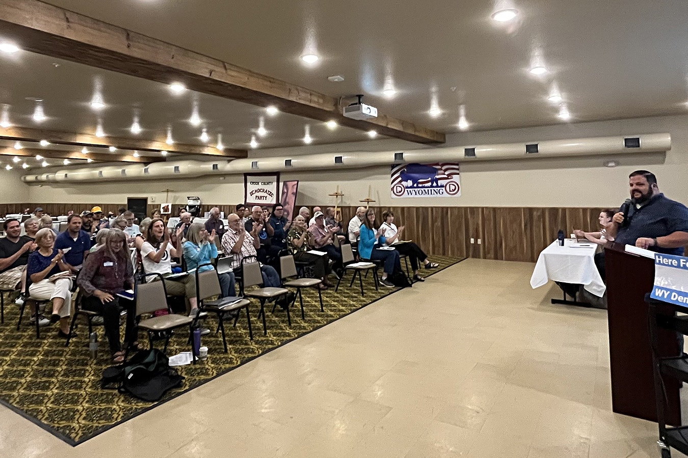 Wyoming Democratic Party Chair Joe Barbuto, right, addresses the Wyoming Democratic Party Central Committee during their meeting at Isabella's in downtown Newcastle on Saturday.