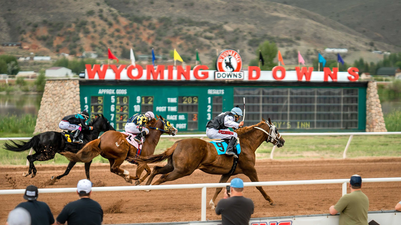 Horses race at the Wyoming Downs racetrack in Evanston, Wyoming.