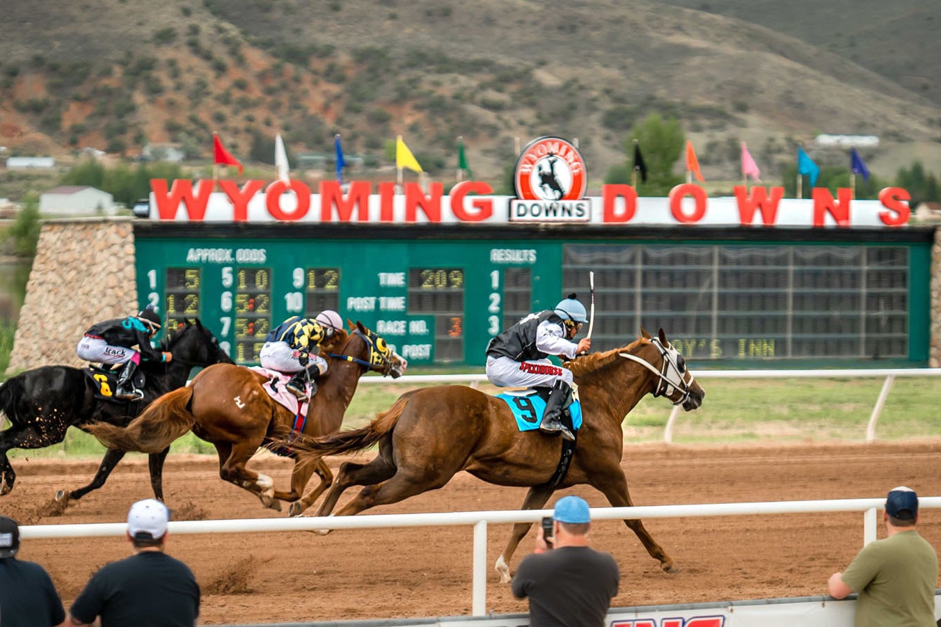 Horses race at the Wyoming Downs racetrack in Evanston, Wyoming.