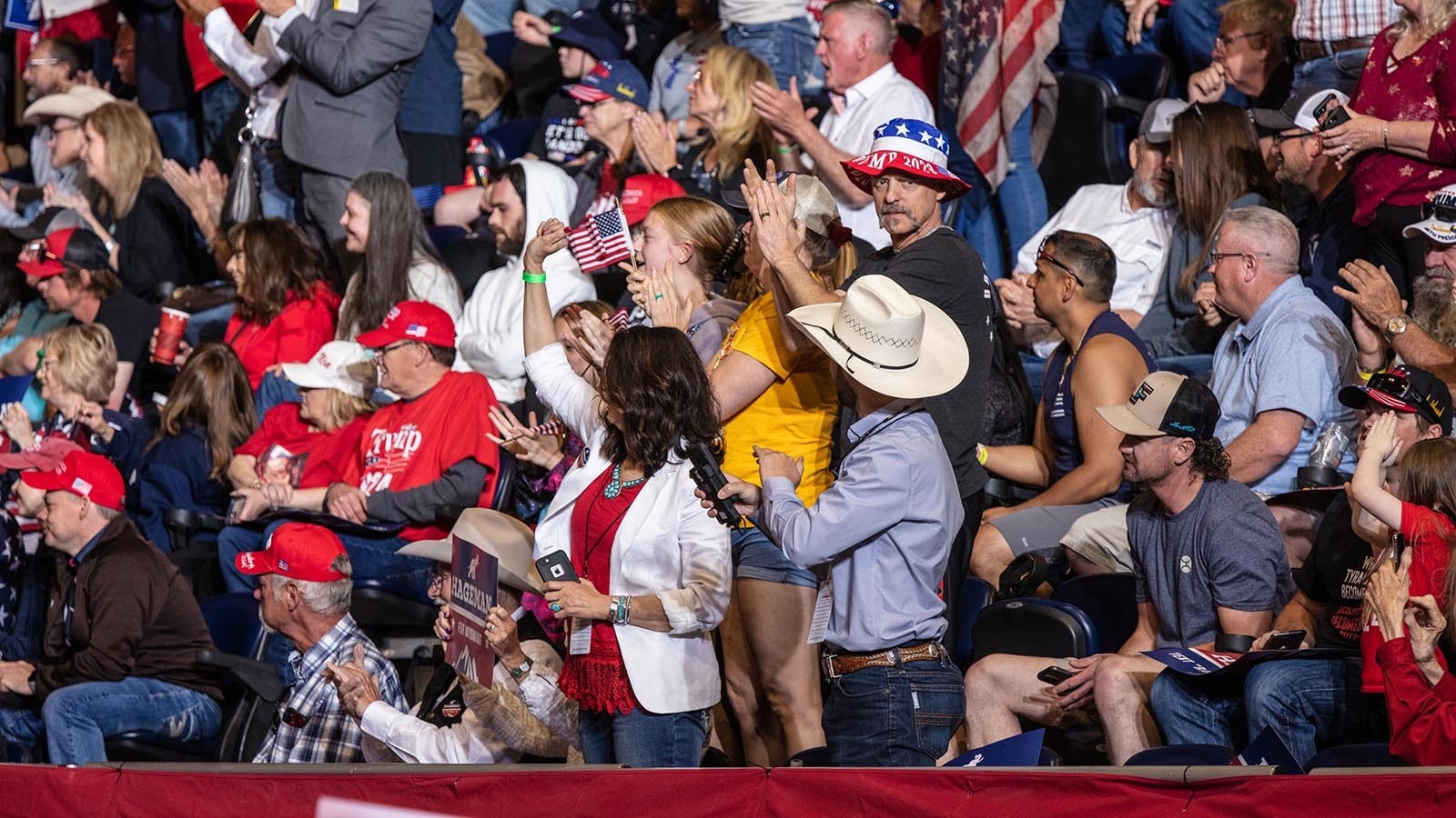 Thousands of Wyoming Republicans rallied in Casper for a visit by former President Donald Trump in May 2022. Already a solidly red state politically, data shows Wyoming is getting redder as people move from neighboring Colorado and other blue states.