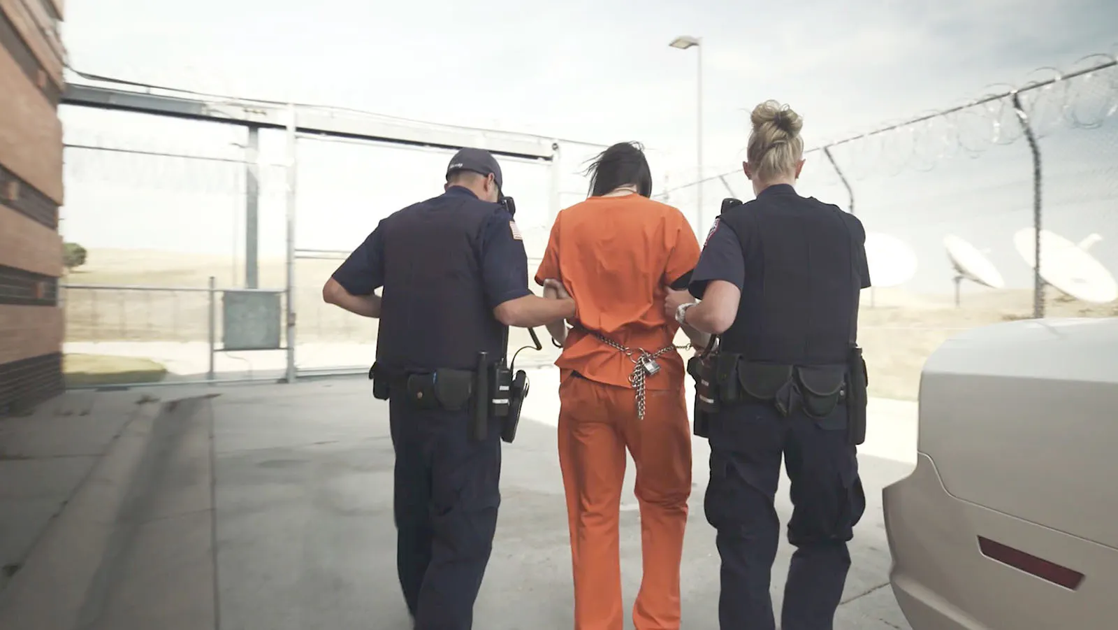 Wyoming’s understaffed prisons have 109 vacant positions, despite years of recruiting efforts. Now they're turning to military veterans because “there's not too many people in prison that are there for singing too loud in church,” said a former official. Above, a pair of Wyoming correcrtions officers move an inmate in a file photo.