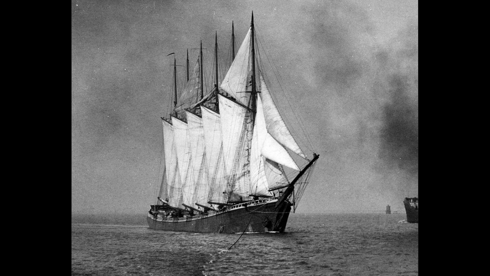 The Wyoming takes a tow into port in this undated photo.