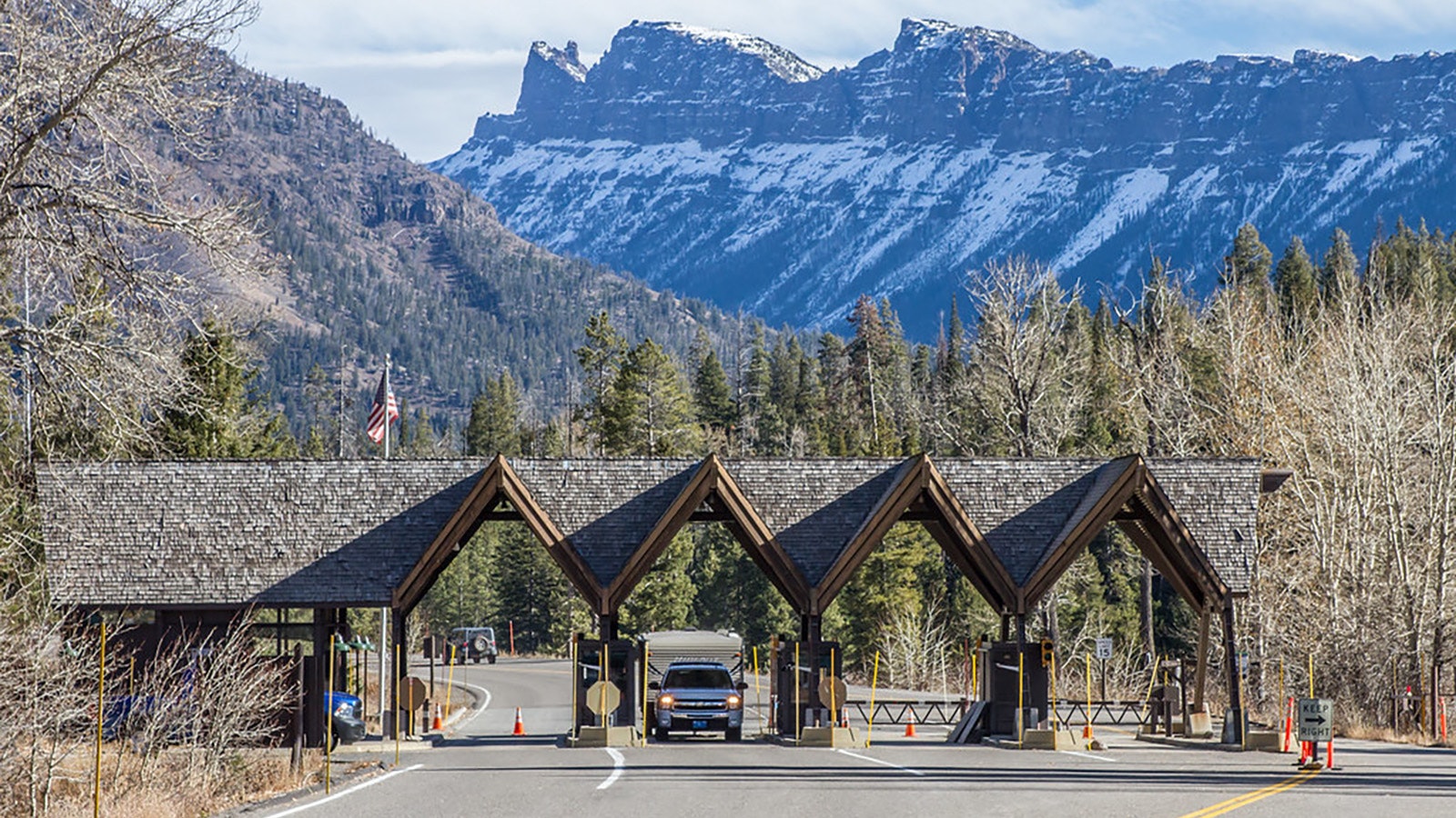 Although it's not considered the "peak" season for tourism in and around Yellowstone National Park, the October shoulder season has become much more popular. The East Gate, shown here, is open through October, usually closing the first Monday in November.