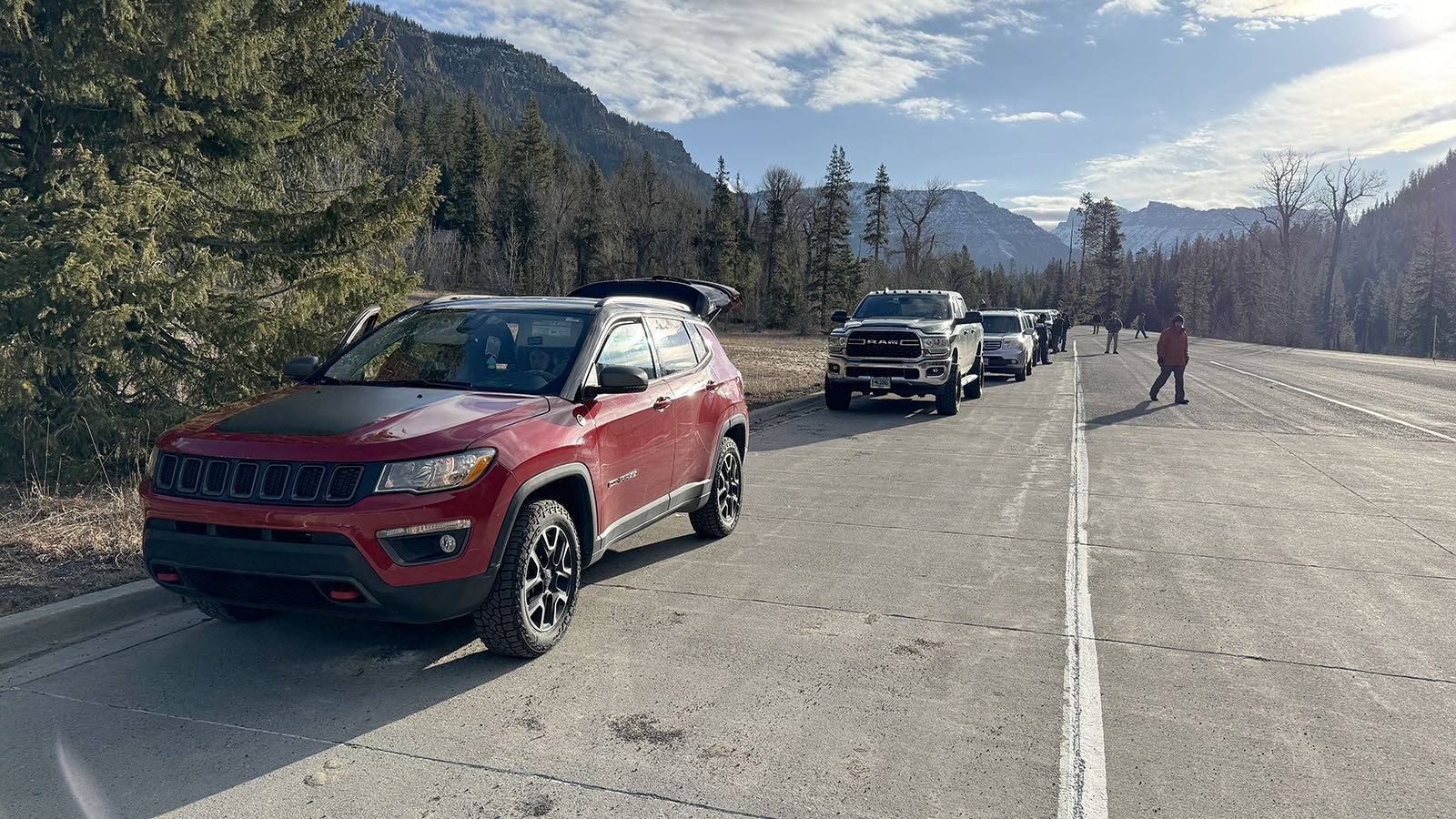 Stacy Boisseau's Jeep Compass at the front of the line to enter Yellowstone through the East Entrance of Yellowstone on Friday morning.