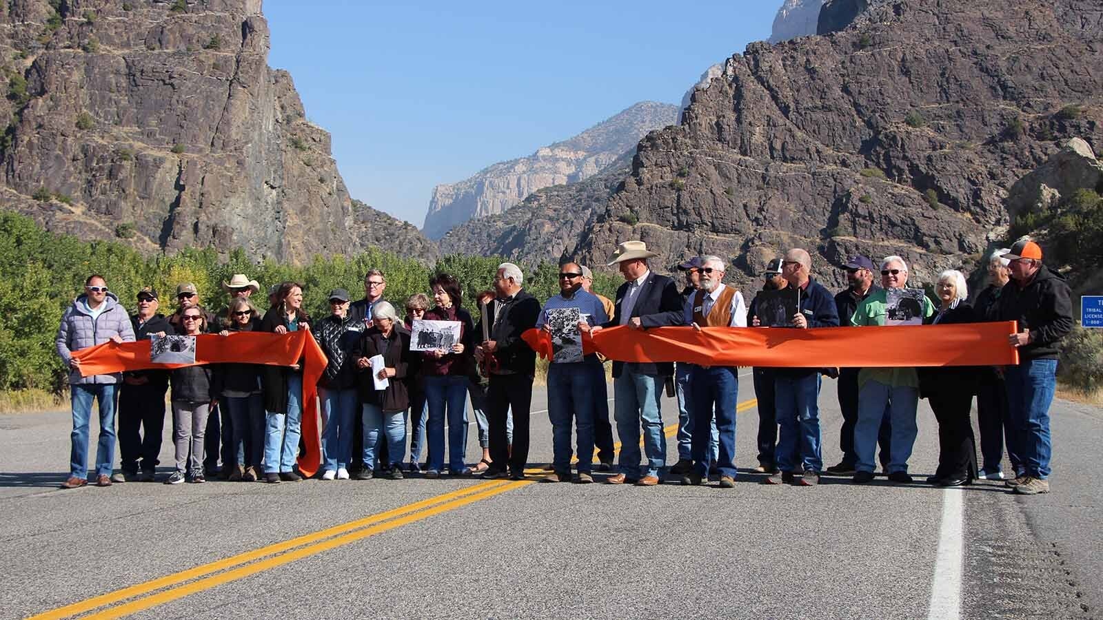 A ribbon cutting on Oct. 1, 2024, to mark the 100th anniversary of the opening of the Yellowstone Highway.