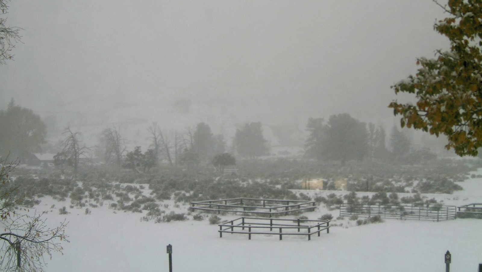 This Wednesday afternoon screenshot from a National Park Service webcam of Mammoth Hot Springs in Yellowstone National Park shows winter has settled in.