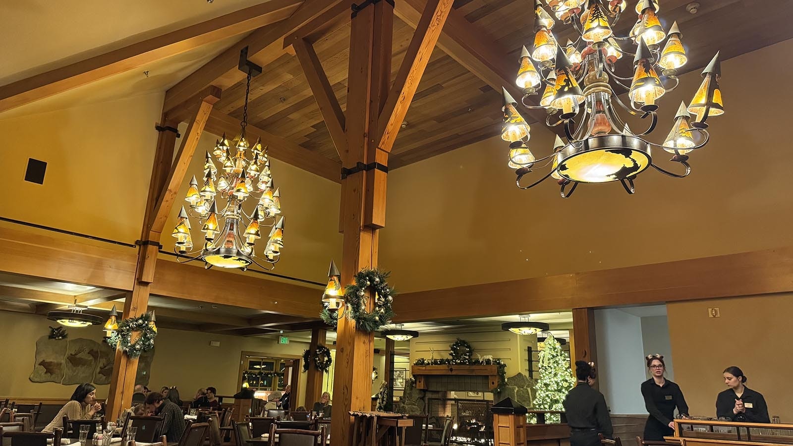 The chandeliers and Christmas decor in the Obsidian Dining Room at the Old Faithful Snow Lodge.