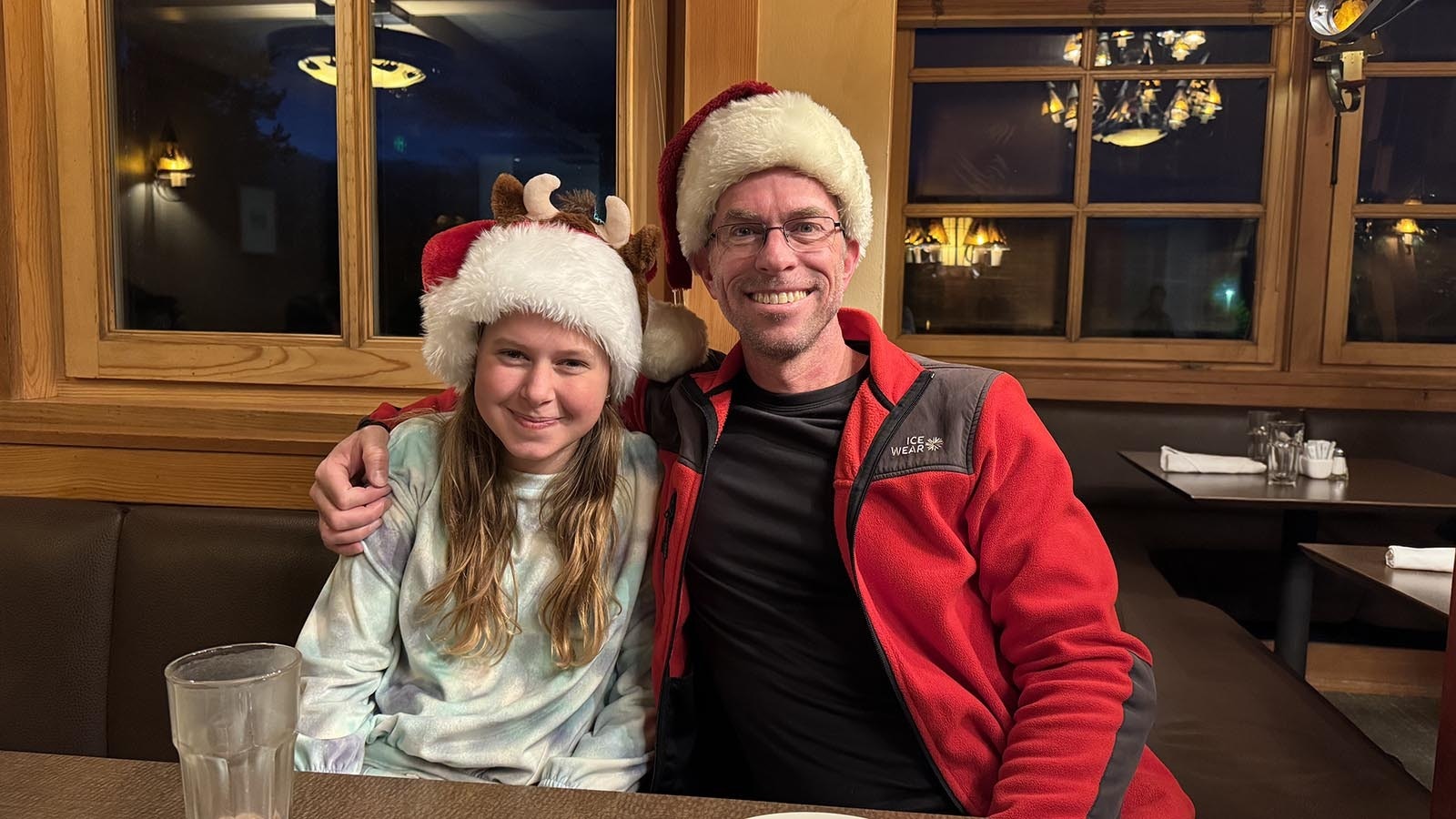 Zoey and Kevin Mueller of St. Louis, Missouri, enjoying a meal in the Obsidian Dining Room at the Old Faithful Snow Lodge.