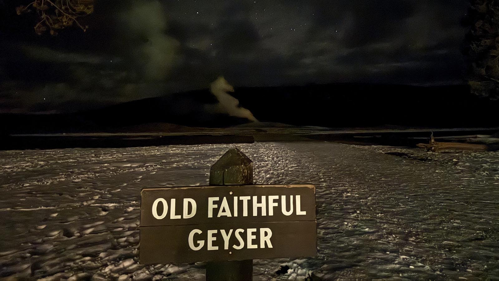 The deserted boardwalk in front of Old Faithful during Christmas week.